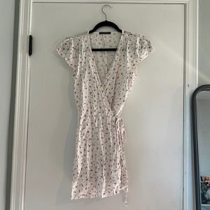 S, Brandy Melville, White floral wrap around tie dress, gently used.